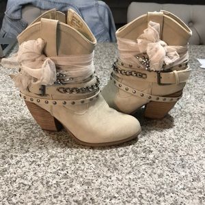Tan Cowgirl booties with studding and now.